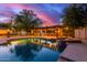 Relaxing pool with a swim-up bar, creating a resort-like atmosphere at 1020 E Caroline Ln, Tempe, AZ 85284