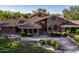 Luxury home with brick exterior and mature landscaping at 1020 E Caroline Ln, Tempe, AZ 85284