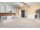 Bedroom with built-in desk, large closet and ceiling fan at 1020 E Caroline Ln, Tempe, AZ 85284
