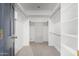 Large walk-in closet with shelves and rods at 1020 E Caroline Ln, Tempe, AZ 85284