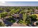 Aerial view of luxurious home with large lot and landscaping at 1020 E Caroline Ln, Tempe, AZ 85284