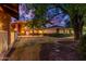 Landscaped backyard with brick patio and walkway at 1020 E Caroline Ln, Tempe, AZ 85284