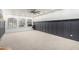 Large living room with gray board and batten wall at 1020 E Caroline Ln, Tempe, AZ 85284