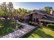 Brick home with a large yard and driveway at 1020 E Caroline Ln, Tempe, AZ 85284