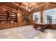 Home office with built-in shelves and wood desk at 1020 E Caroline Ln, Tempe, AZ 85284