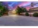 Two-car garage with additional parking and basketball court at 1020 E Caroline Ln, Tempe, AZ 85284