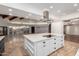 Modern kitchen with large island and high ceilings at 1020 E Caroline Ln, Tempe, AZ 85284