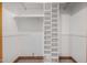 Large closet with built-in shelving and hanging rods at 1020 E Caroline Ln, Tempe, AZ 85284