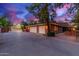 Three-car garage with additional parking and gated entry at 1020 E Caroline Ln, Tempe, AZ 85284