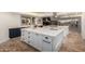 Modern kitchen with two islands and white cabinets at 1020 E Caroline Ln, Tempe, AZ 85284
