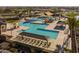 Large community pool with multiple areas and lounge chairs at 19749 S 231 St. Way, Queen Creek, AZ 85142