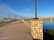Walking path with a scenic view of the lake and community at 19749 S 231 St. Way, Queen Creek, AZ 85142