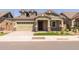 Two-story craftsman style home with attached garage at 19749 S 231 St. Way, Queen Creek, AZ 85142