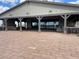Outdoor patio area with fireplace and seating at 19749 S 231 St. Way, Queen Creek, AZ 85142