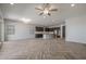 Open kitchen with dark cabinetry, granite countertops, and an island at 19749 S 231 St. Way, Queen Creek, AZ 85142