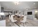 Open dining room with modern table setting and kitchen views at 19749 S 231 St. Way, Queen Creek, AZ 85142