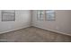 Secondary bedroom with neutral wall paint and carpet flooring at 19749 S 231 St. Way, Queen Creek, AZ 85142