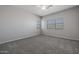 Simple bedroom with neutral walls, carpet flooring and multiple windows at 19749 S 231 St. Way, Queen Creek, AZ 85142