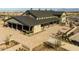 Barn-style community center with large covered patio at 19749 S 231 St. Way, Queen Creek, AZ 85142