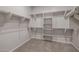 Large walk-in closet with ample shelving and hanging space at 19749 S 231 St. Way, Queen Creek, AZ 85142