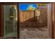 Private courtyard with stone walls and water feature at 3831 E Huber St, Mesa, AZ 85205