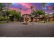 Circular driveway with fountain and palm trees at 3831 E Huber St, Mesa, AZ 85205