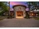 Stone facade entrance with arched entryway at 3831 E Huber St, Mesa, AZ 85205