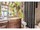 Bathroom with vanity, toilet and shower/tub combo at 3831 E Huber St, Mesa, AZ 85205
