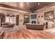 Spacious living room featuring hardwood floors and a fireplace at 3831 E Huber St, Mesa, AZ 85205