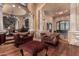 Elegant living room with ornate furnishings and hardwood floors at 3831 E Huber St, Mesa, AZ 85205
