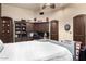Bedroom with built-in cabinetry and a comfortable bed at 3831 E Huber St, Mesa, AZ 85205