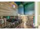 Spa-like bathroom with artistic tile work, granite sink, and modern fixtures at 3831 E Huber St, Mesa, AZ 85205