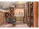 Well-stocked wine cellar with various wine racks and storage at 3831 E Huber St, Mesa, AZ 85205