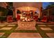 Outdoor fire pit area with seating, perfect for entertaining at 3831 E Huber St, Mesa, AZ 85205