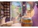 Themed bathroom with vineyard mural and barrel sink at 3831 E Huber St, Mesa, AZ 85205