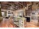 Spacious kitchen with a large island and exposed wooden beams at 3831 E Huber St, Mesa, AZ 85205