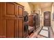 Hallway with built-in storage and wood flooring at 3831 E Huber St, Mesa, AZ 85205