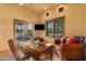 Home office with built-in desk and leather seating at 3831 E Huber St, Mesa, AZ 85205