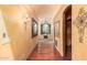 Long hallway with high ceilings and wood floors at 3831 E Huber St, Mesa, AZ 85205