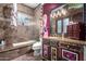 Unique bathroom with a vibrant vanity and a soaking tub at 3831 E Huber St, Mesa, AZ 85205
