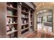 Elegant library with built-in bookshelves and hardwood floors at 3831 E Huber St, Mesa, AZ 85205