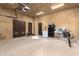 Spacious garage with storage cabinets and room for multiple vehicles at 3831 E Huber St, Mesa, AZ 85205