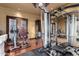 Bright home gym with weight machine and other exercise equipment at 3831 E Huber St, Mesa, AZ 85205