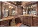 Double vanity bathroom with granite countertops at 3831 E Huber St, Mesa, AZ 85205