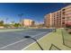 Well-maintained tennis court with surrounding landscaping at 7930 E Camelback Rd # 506, Scottsdale, AZ 85251