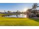Scenic community pond with lush landscaping and fountain, providing a tranquil atmosphere at 7930 E Camelback Rd # 506, Scottsdale, AZ 85251
