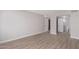 Spacious bedroom with wood-look floors and private bathroom access at 7930 E Camelback Rd # 506, Scottsdale, AZ 85251