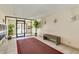 Building lobby with a carpet, plants and bench at 7930 E Camelback Rd # 506, Scottsdale, AZ 85251