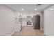 Updated kitchen featuring granite countertops and white cabinetry at 7930 E Camelback Rd # 506, Scottsdale, AZ 85251