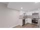 Modern kitchen with white cabinets and stainless steel appliances at 7930 E Camelback Rd # 506, Scottsdale, AZ 85251